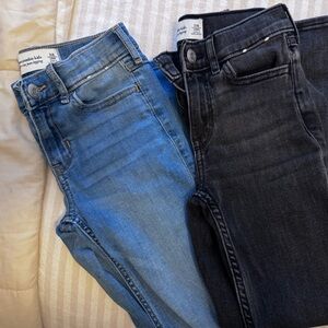 Two pairs of Abercrombie kids 7/8 long high rise Jean legging.